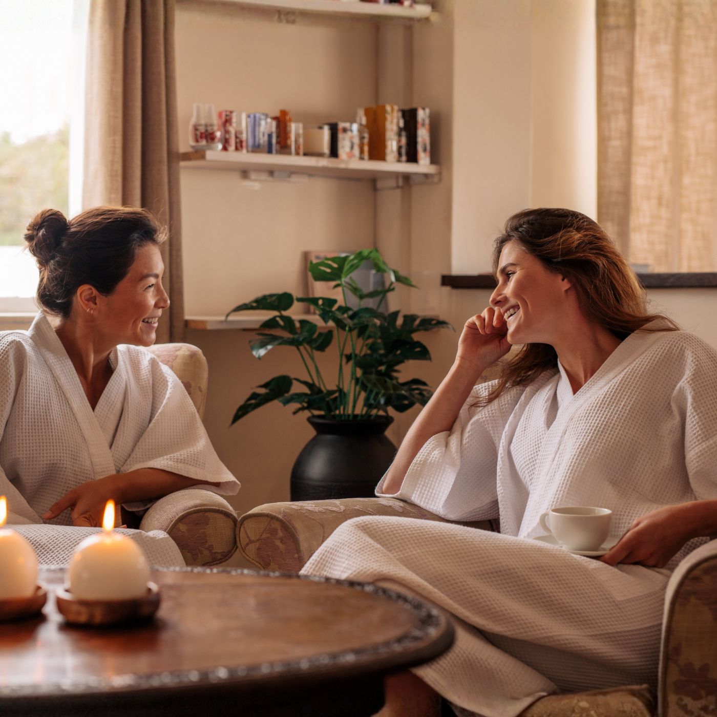 Two women in a calm, cozy setting in Northeast Macfarlane, representing deep and intentional friendships after 40.